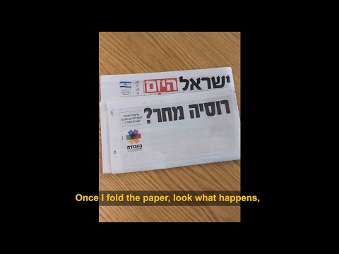 THE FOLDED NEWSPAPER