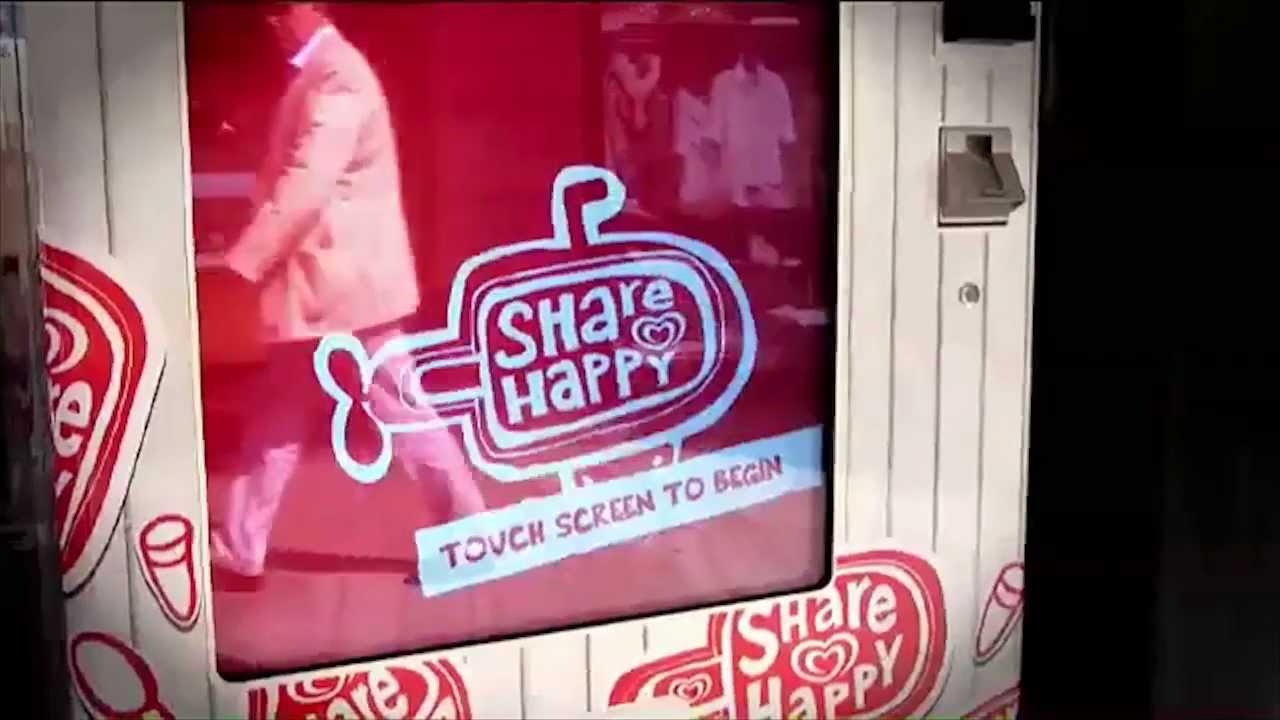 SMILE ACTIVATED VENDING MACHINE - image 1